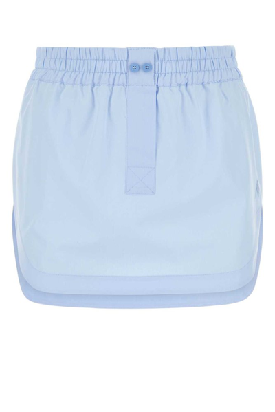 Shop Attico The  Rooney Curved Hem Mini Skirt In Blue