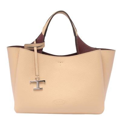 Shop Tod's Logo Plaque Top Handle Bag In Beige