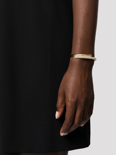 Shop Swarovski Dextera Crystal-embellished Bangle Bracelet In Gold