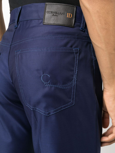 Shop Corneliani Logo-embroidered Virgin Wool Trousers In Blue
