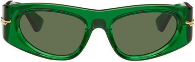 Shop Bottega Veneta Green Oval Sunglasses In 004 Green