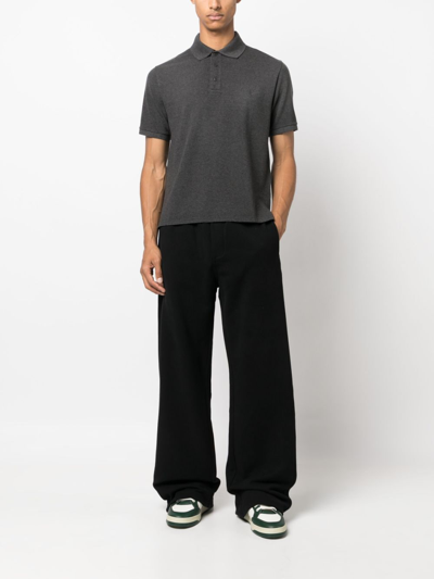 Shop Saint Laurent Wide-leg Cotton Track Pants In Schwarz