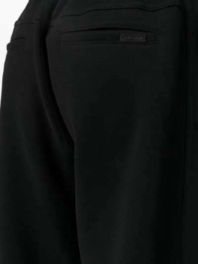 Shop Saint Laurent Wide-leg Cotton Track Pants In Schwarz