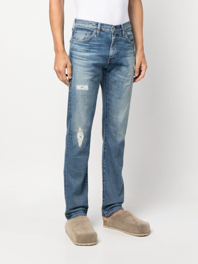 Shop Levi's Mid-rise Straight-leg Jeans In Blue