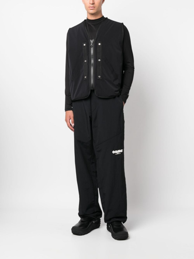 Shop Oamc Logo-patch Track Pants In Schwarz