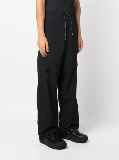 Shop Oamc Logo-patch Track Pants In Schwarz