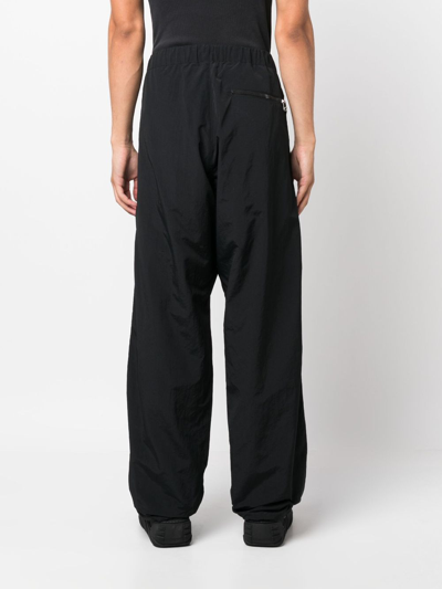 Shop Oamc Logo-patch Track Pants In Schwarz