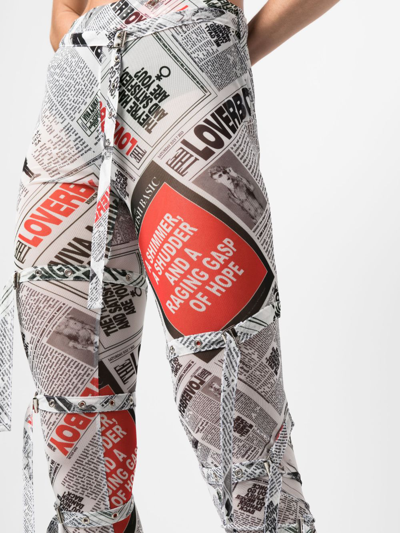 Shop Charles Jeffrey Loverboy Newspaper-print Skinny Trousers In Black