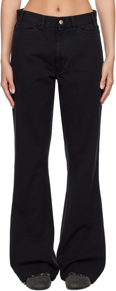 Shop Stockholm Surfboard Club Black Flared Trousers
