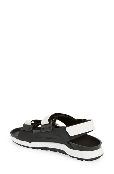 Shop Birkenstock Tatacoa Slingback Sport Sandal In Futura Black/ White
