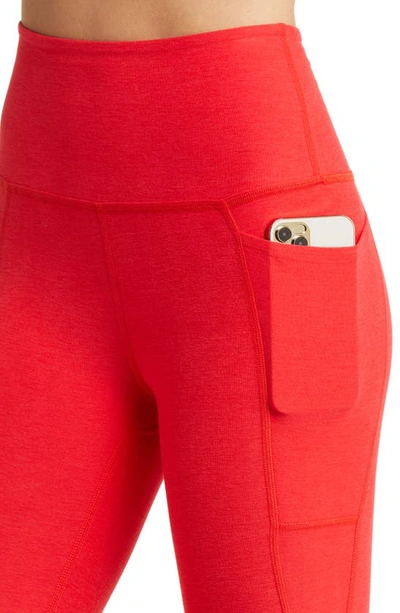 Shop Beyond Yoga Space Dye Out Of Pocket Side Pocket High Waist Capri Leggings In Candy Apple Red Heather