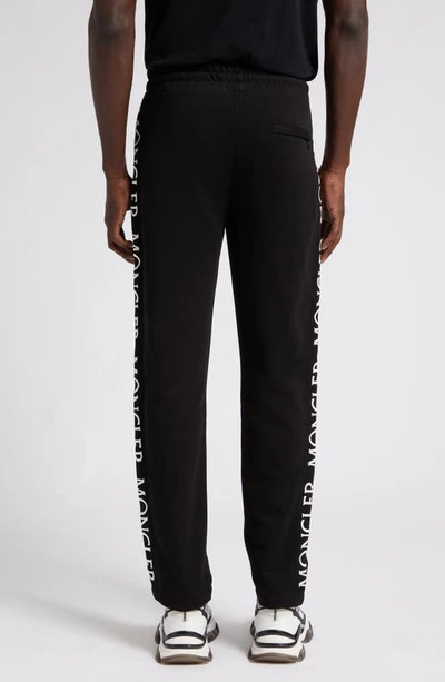 Shop Moncler Logo Embroidered Cotton Sweatpants In Black