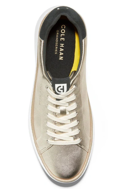Shop Cole Haan Grandpro Topspin Sneaker In Gold/ Black
