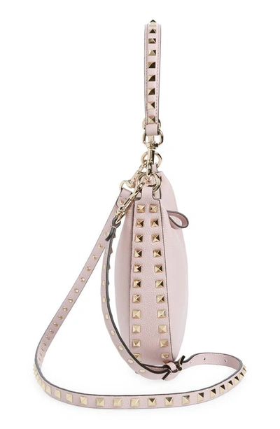 Shop Valentino Small Rockstud Leather Hobo Bag In Water Lilac