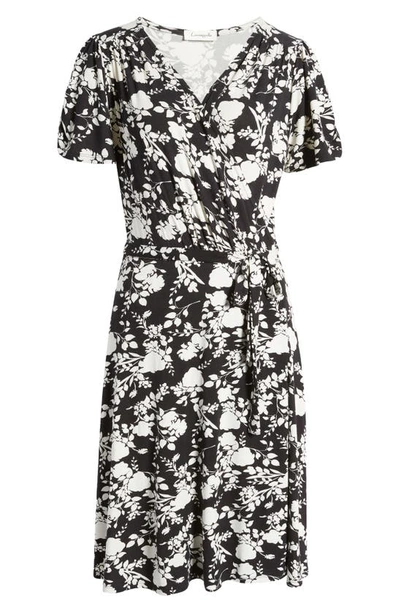 Shop Loveappella Short Sleeve Jersey Faux Wrap Dress In Black/ Ivory