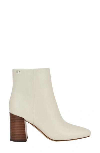 Shop Calvin Klein Audrina Bootie In Ivory Leather