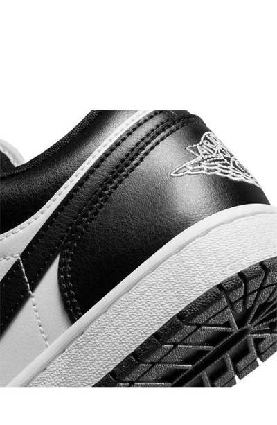 Shop Jordan Air  1 Low Sneaker In White/ Black/ White