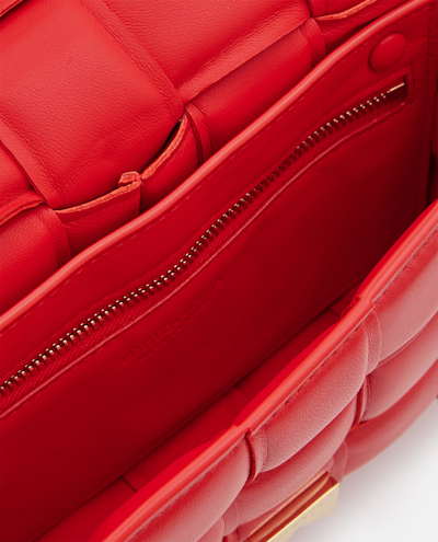 Shop Bottega Veneta Small Padded Cassette Leather Crossbody Bag In Red