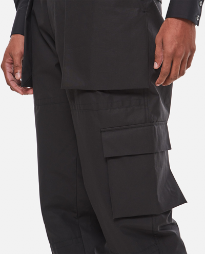 Shop Alexander Mcqueen Cargo Pants In Black