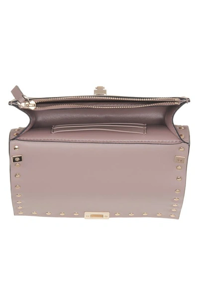 Shop Valentino Rockstud Leather Crossbody Bag In 6e0 Water Lilac