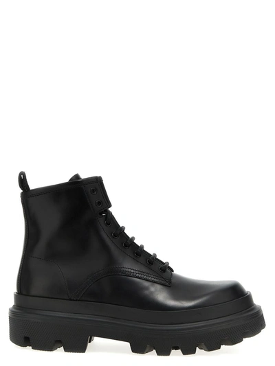Shop Dolce & Gabbana Logo Tag Leather Combat Boots In Black