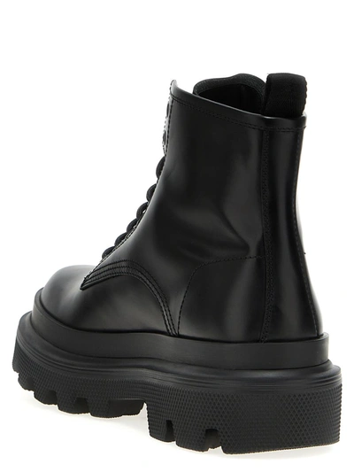 Shop Dolce & Gabbana Logo Tag Leather Combat Boots In Black