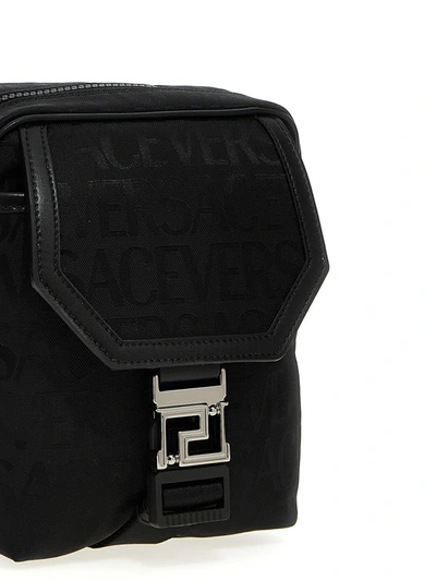Shop Versace Logo Crossbody Bag In Black