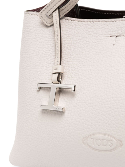 Shop Tod's Mini Logo-charm Crossbody Bag In Grey