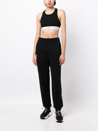 Shop Sporty And Rich Fine-ribbed Cropped Tank Top In Black