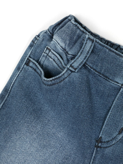 Shop Emporio Armani Embroidered-logo Stretch-cotton Jeans In Blue