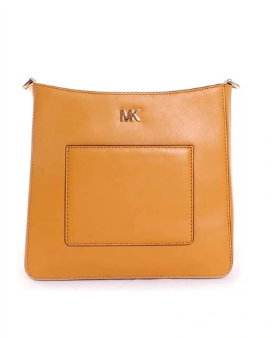 Shop Michael Kors Gloria Pocket Swing Pack Crossbody In Marigold In Orange