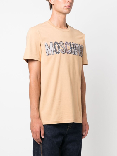 Shop Moschino Logo-patch Cotton T-shirt In Neutrals