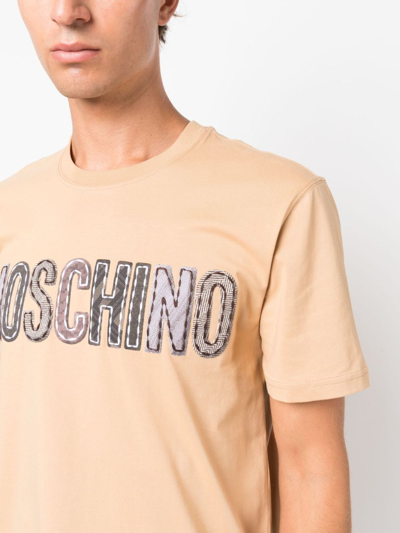 Shop Moschino Logo-patch Cotton T-shirt In Neutrals