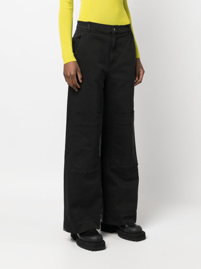 Shop P.a.r.o.s.h Low-rise Wide-leg Jeans In Black