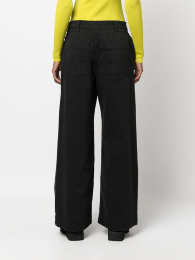 Shop P.a.r.o.s.h Low-rise Wide-leg Jeans In Black