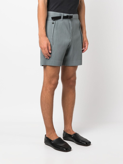 Shop Issey Miyake Flip Elasticated Pleated Shorts In Green
