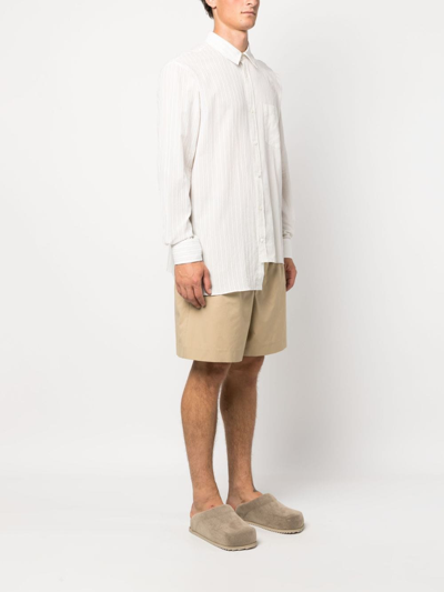 Shop Lanvin Striped Asymmetric-hem Shirt In Neutrals