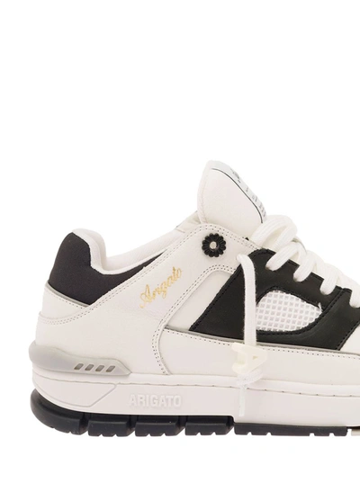 Shop Axel Arigato 'area Cloud' Black And White Low Top Sneakers With Laminated Leather In Leather Blend Man In White/black