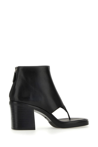 Miu Miu Leather Thong Ankle Boots In Nero