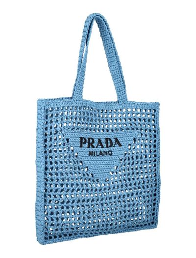 Shop Prada Logo Embroidered Woven Tote Bag In Celeste