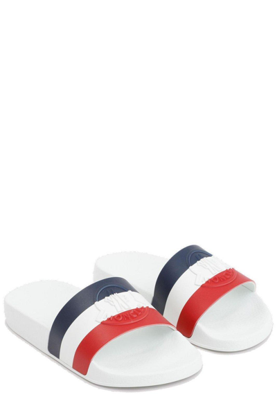 Shop Moncler Logo Embossed Flat Sandals