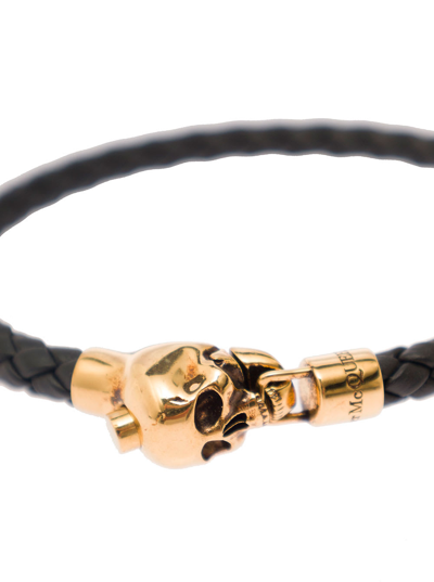 Shop Alexander Mcqueen Black Braided Leather Bracelet With Skull Detail In Brass Man