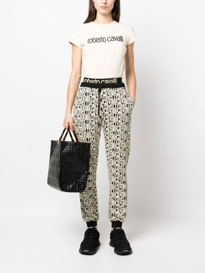 Roberto Cavalli Snakeskin-print Track Pants In Black
