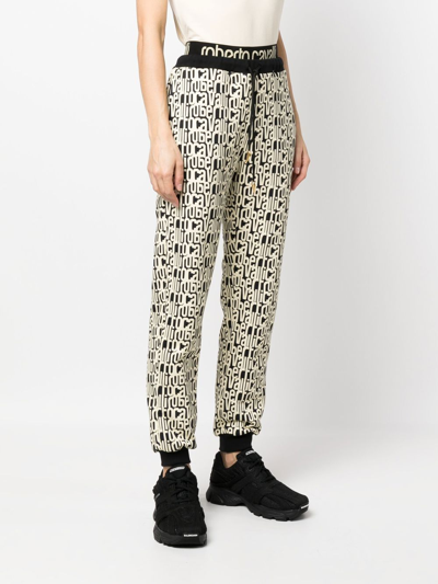 Roberto Cavalli Snakeskin-print Track Pants In Black