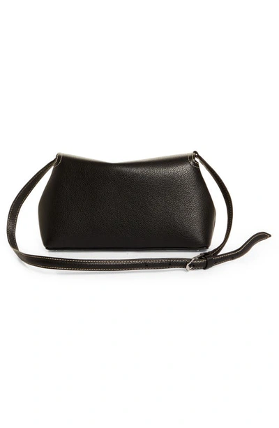 Shop Totême T-lock Leather Clutch In Black Grain