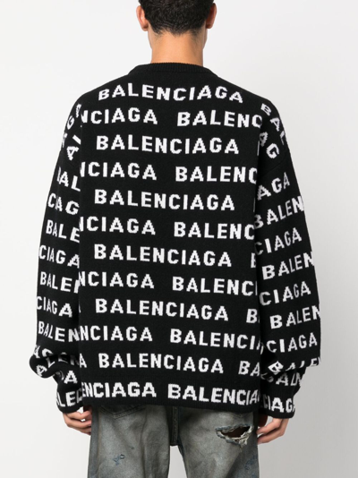 Balenciaga Logo All Over Print Pullover Sweater In Black