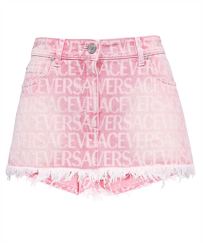 Shop Versace Monogram-jacquard Denim Mini Skirt In Pink
