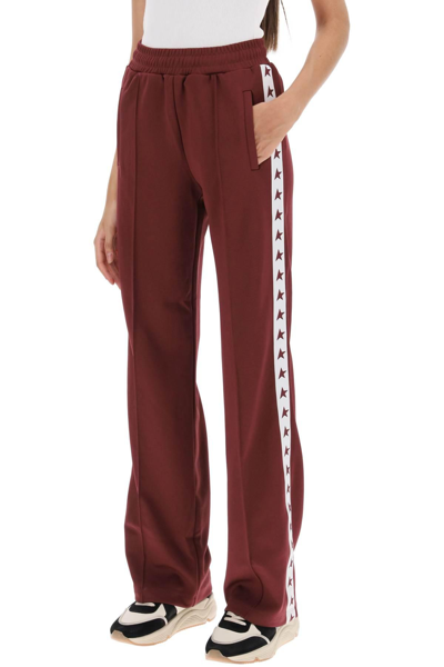 Shop Golden Goose 'dorotea' Track Pants With Star Bands In Red