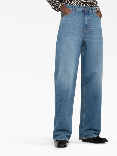 Shop Valentino Logo-plaque Wide-leg Jeans In Blue