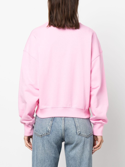 Shop Msgm Logo-embellished Cotton Sweatshirt In Pink